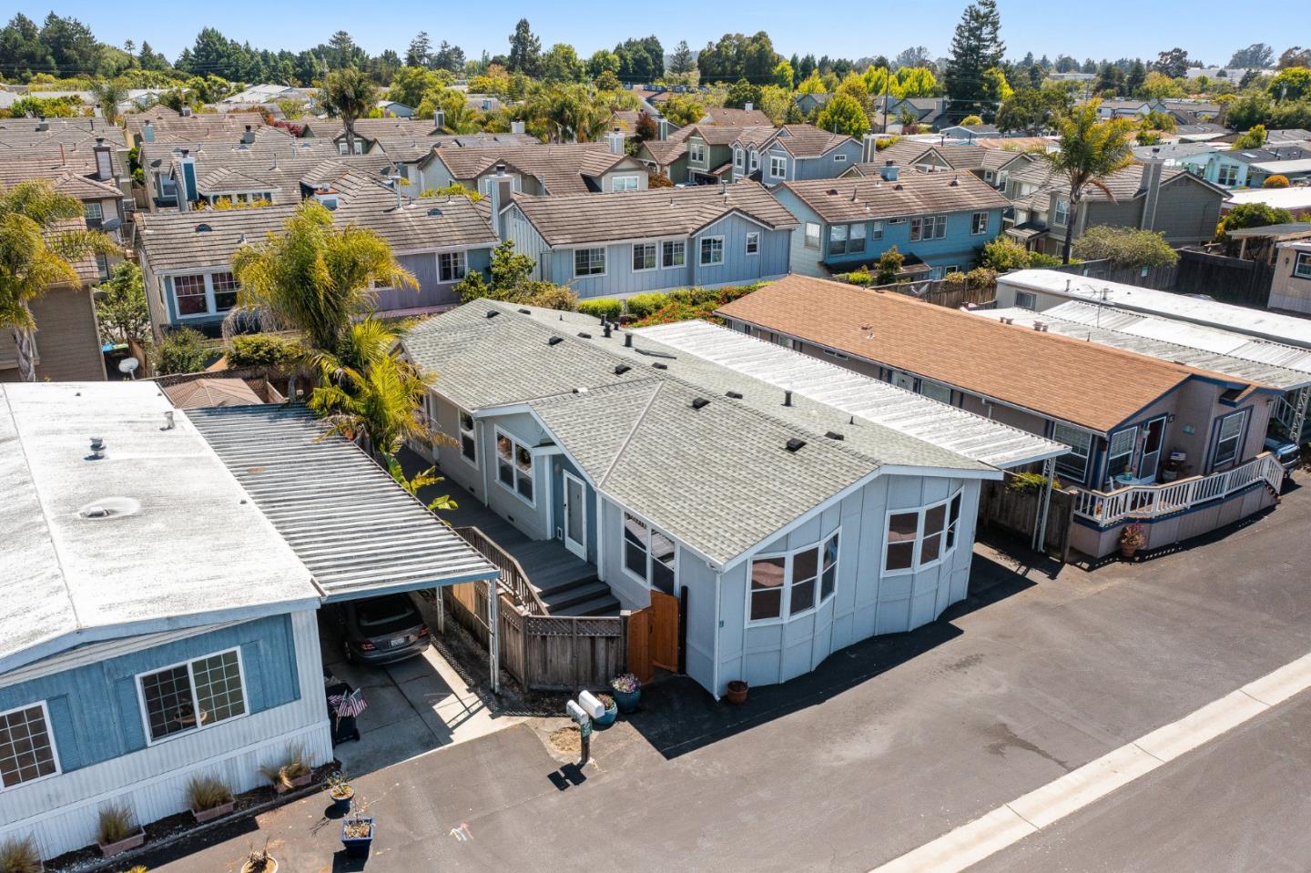 2155 Wharf Road, Unit 9 Capitola, CA 95010 - Photo 5 of 27 an aerial view of residential houses with wooden deck and city view