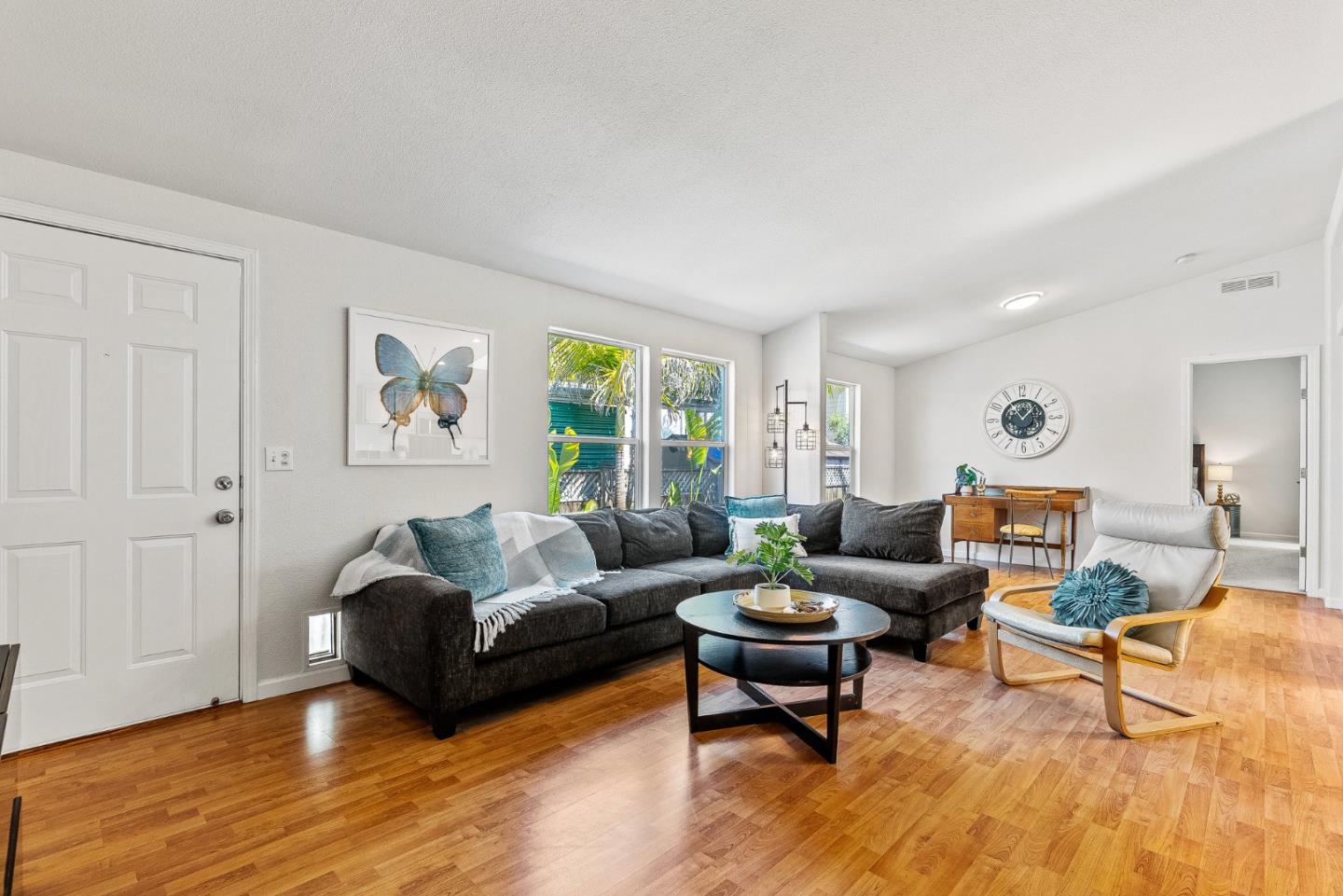 2155 Wharf Road, Unit 9 Capitola, CA 95010 - Photo 8 of 27 a living room with furniture and a wooden floor