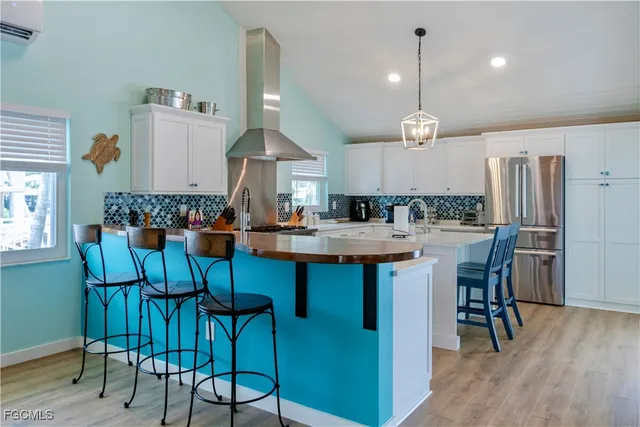 a view of residential houses with outdoor space and lake view