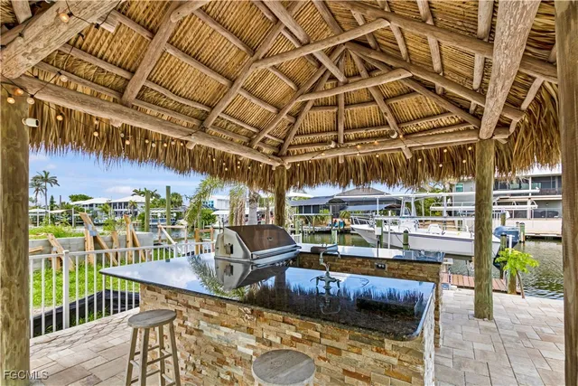 a view of a chairs and table in the patio