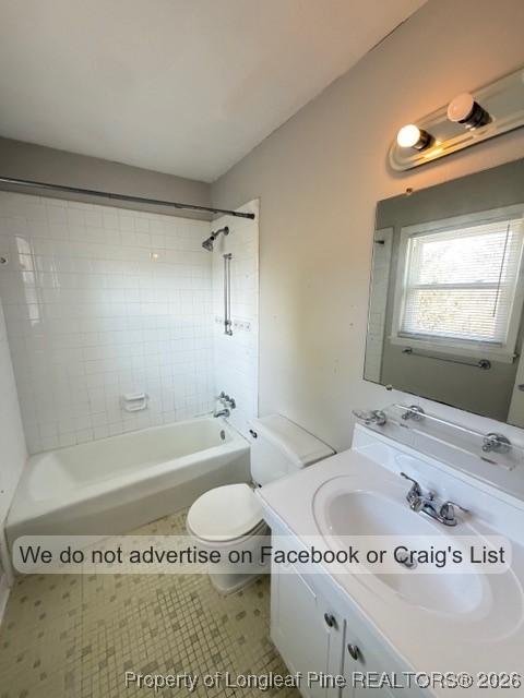 563 Alleghany Road Fayetteville, NC 28304 - Photo 12 of 15 a bathroom with a granite countertop bathtub sink vanity and toilet
