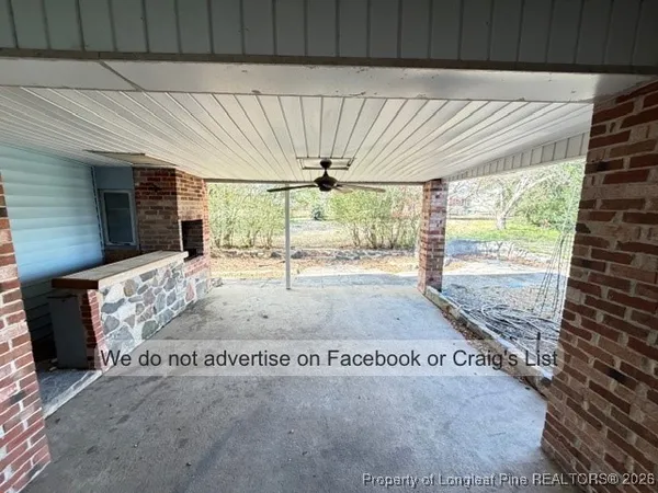 a view of a backyard of the house