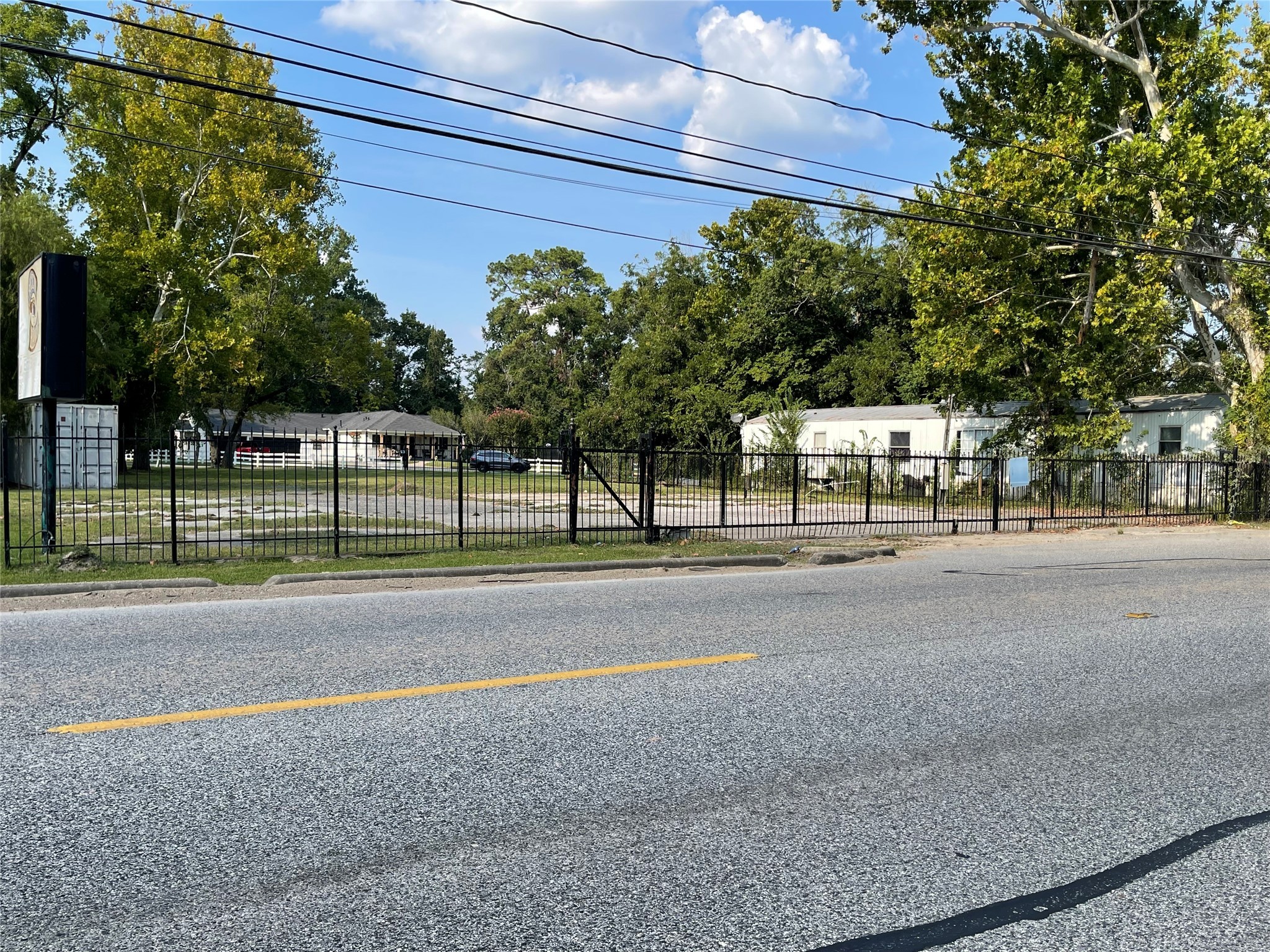 8815 Humble Westfield Road Humble, TX 77338 - Photo 5 of 20 a view of a road with a building in the background