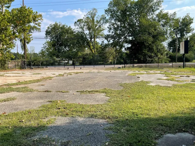 a view of a yard with an outdoor space