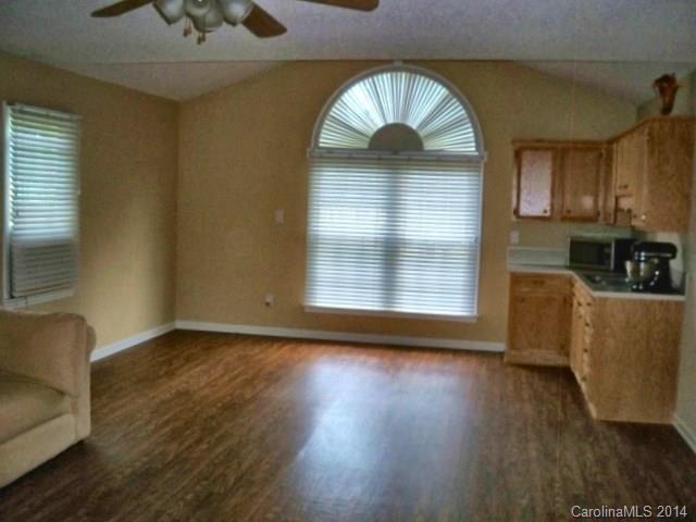 1850 George Brown Road Crouse, NC 28033 - Photo 18 of 23 a view of empty room with wooden floor and fan