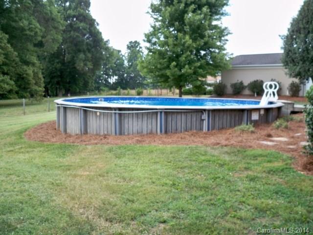1850 George Brown Road Crouse, NC 28033 - Photo 3 of 23 a view of a backyard with a tub