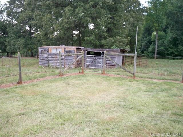 1850 George Brown Road Crouse, NC 28033 - Photo 23 of 23 a backyard of a house with table and chairs