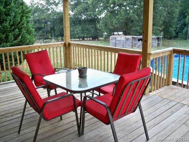 1850 George Brown Road Crouse, NC 28033 - Photo 4 of 23 a outdoor dining space with furniture and wooden floor