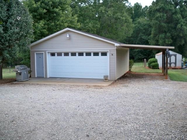 1850 George Brown Road Crouse, NC 28033 - Photo 5 of 23 a front view of a house with garden