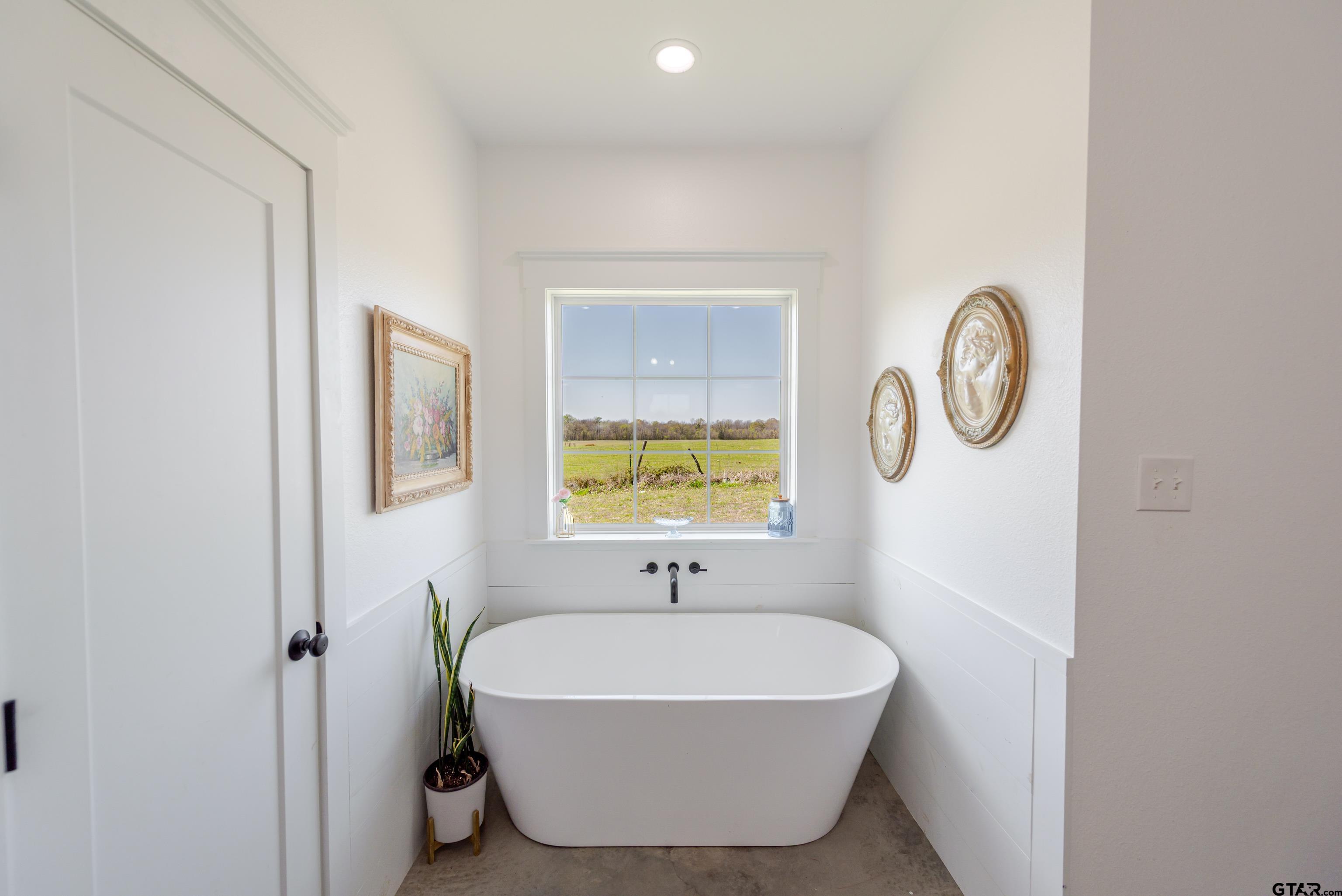 130 County Rd NW 1019 Mount Vernon, TX 75457 - Photo 8 of 17 a bathroom with a sink and a mirror