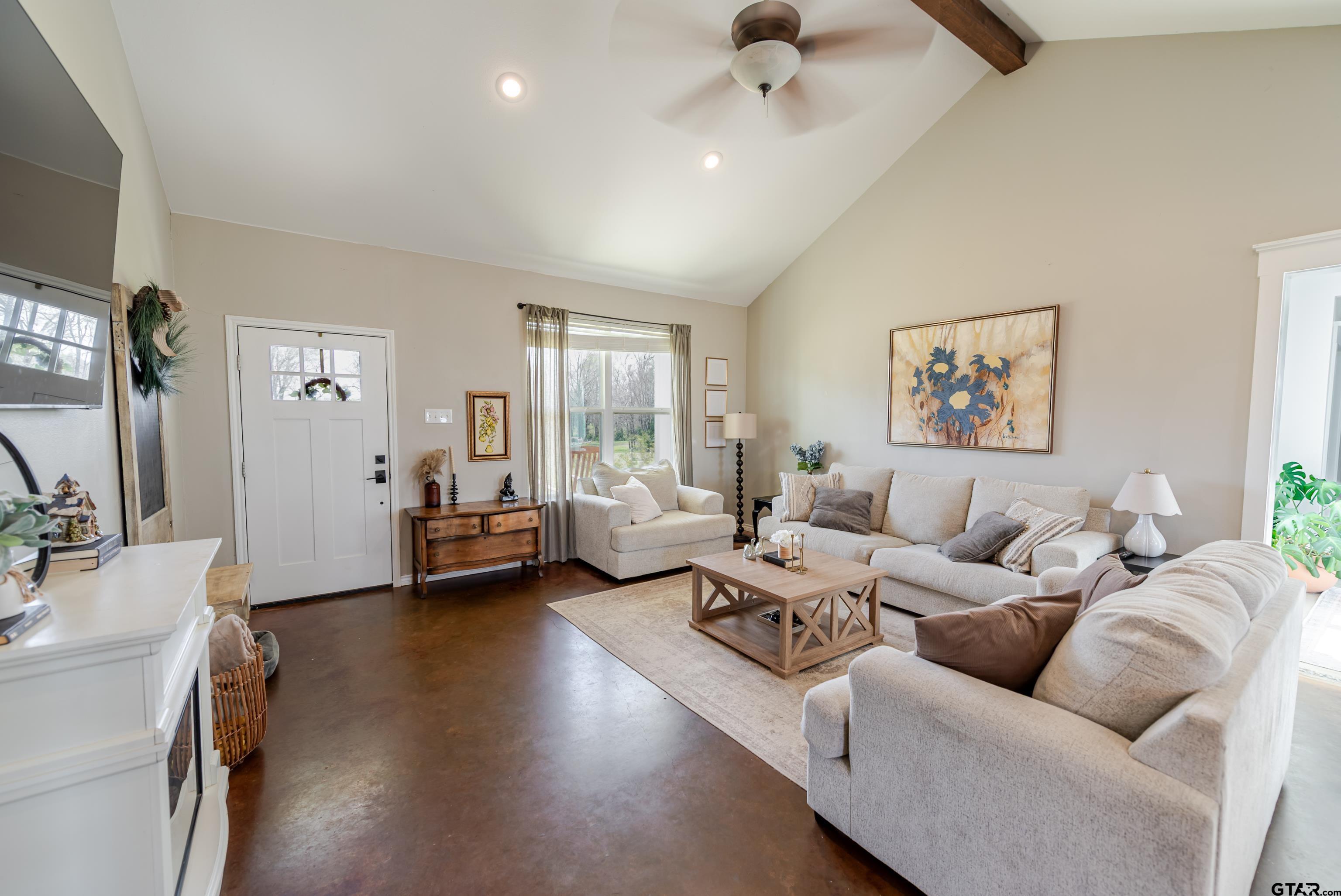 130 County Rd NW 1019 Mount Vernon, TX 75457 - Photo 9 of 17 a living room with furniture and a flat screen tv
