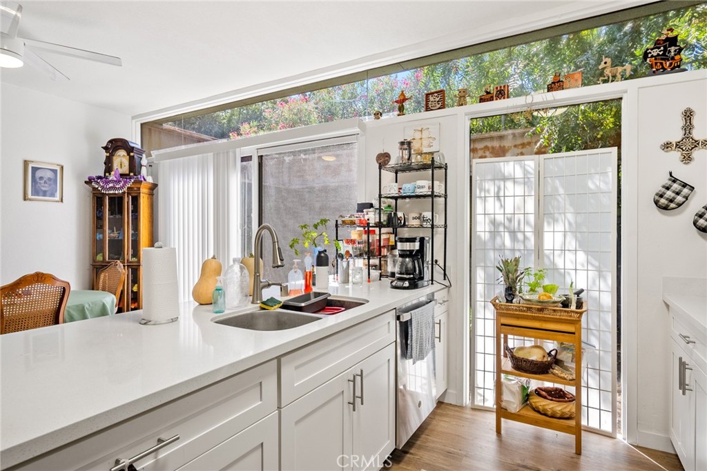6865 Morro Road, Unit A Atascadero, CA 93422 - Photo 11 of 38 a kitchen with appliances and cabinets