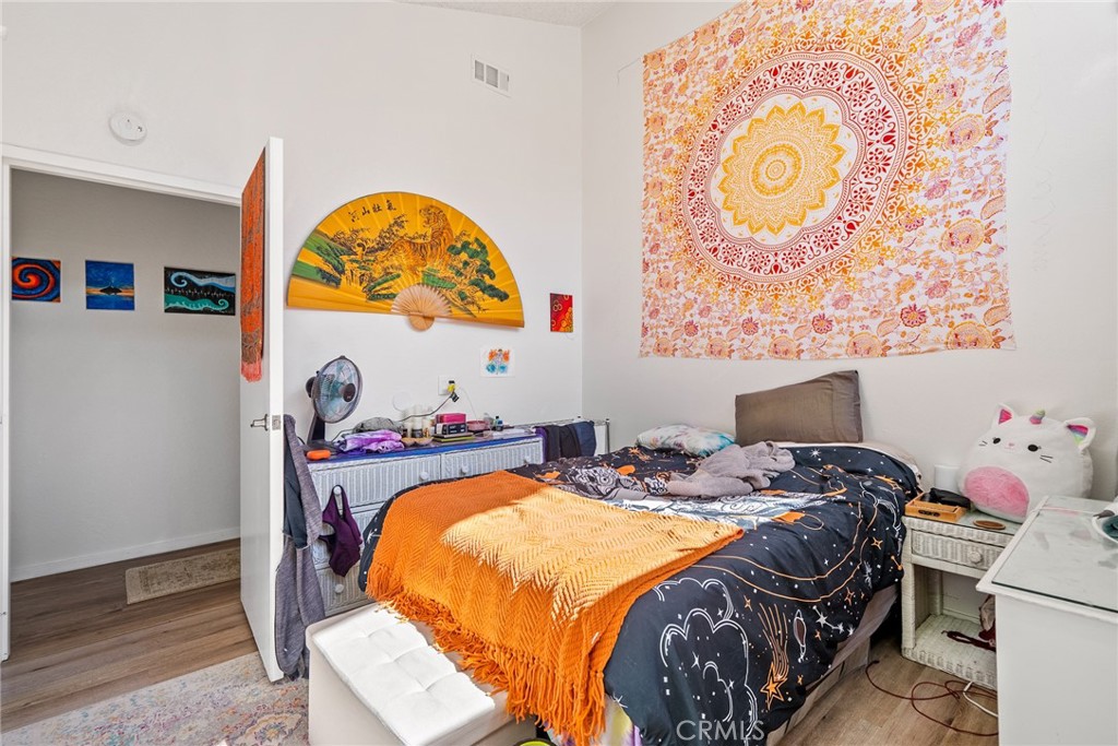 6865 Morro Road, Unit A Atascadero, CA 93422 - Photo 13 of 38 a bed sitting in a bedroom next to a window