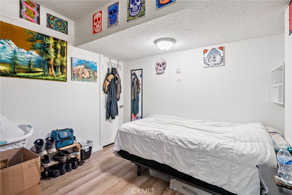 6865 Morro Road, Unit A Atascadero, CA 93422 - Photo 14 of 38 a bedroom with a bed and a desk