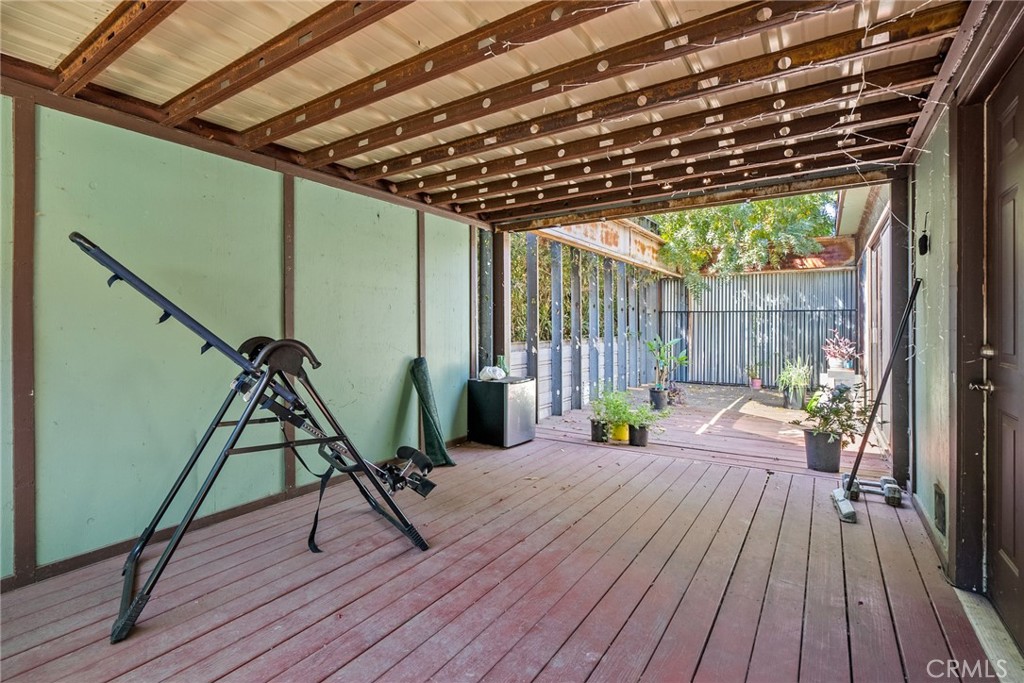 6865 Morro Road, Unit A Atascadero, CA 93422 - Photo 19 of 38 a view of a deck with wooden floor and outdoor seating