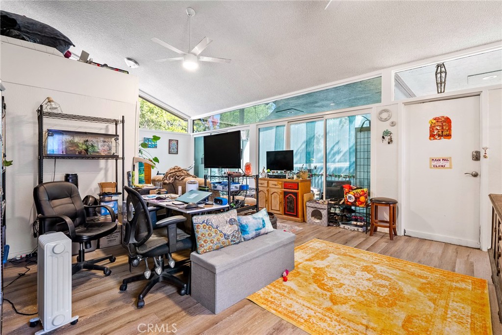 6865 Morro Road, Unit A Atascadero, CA 93422 - Photo 5 of 38 a living room with furniture fireplace and flat screen tv
