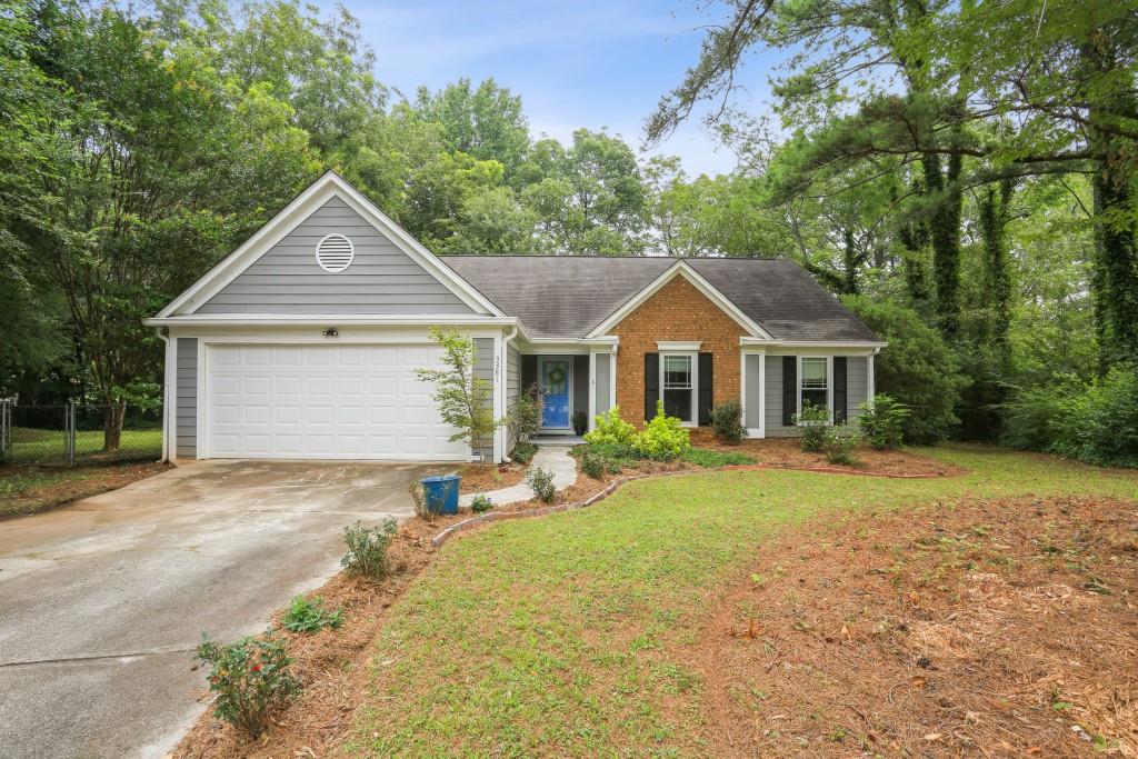 3381 Autumn Cherry Court Decatur, GA 30034 - Photo 1 of 1 a front view of a house with yard and green space