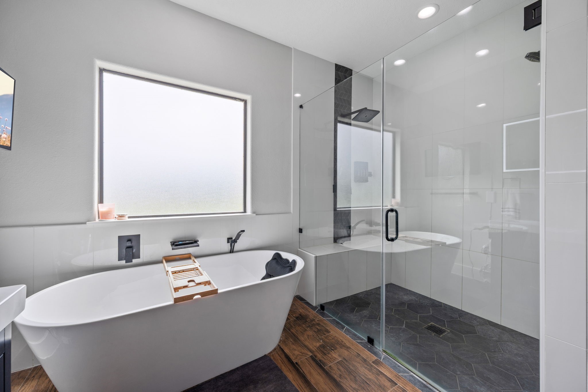 356 Barrow-White Road Anahuac, TX 77514 - Photo 20 of 30 a bathroom with a bathtub and a sink