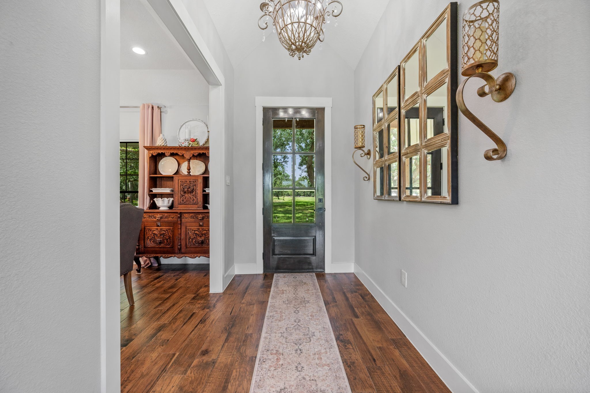 356 Barrow-White Road Anahuac, TX 77514 - Photo 4 of 30 a view of entryway with wooden floor