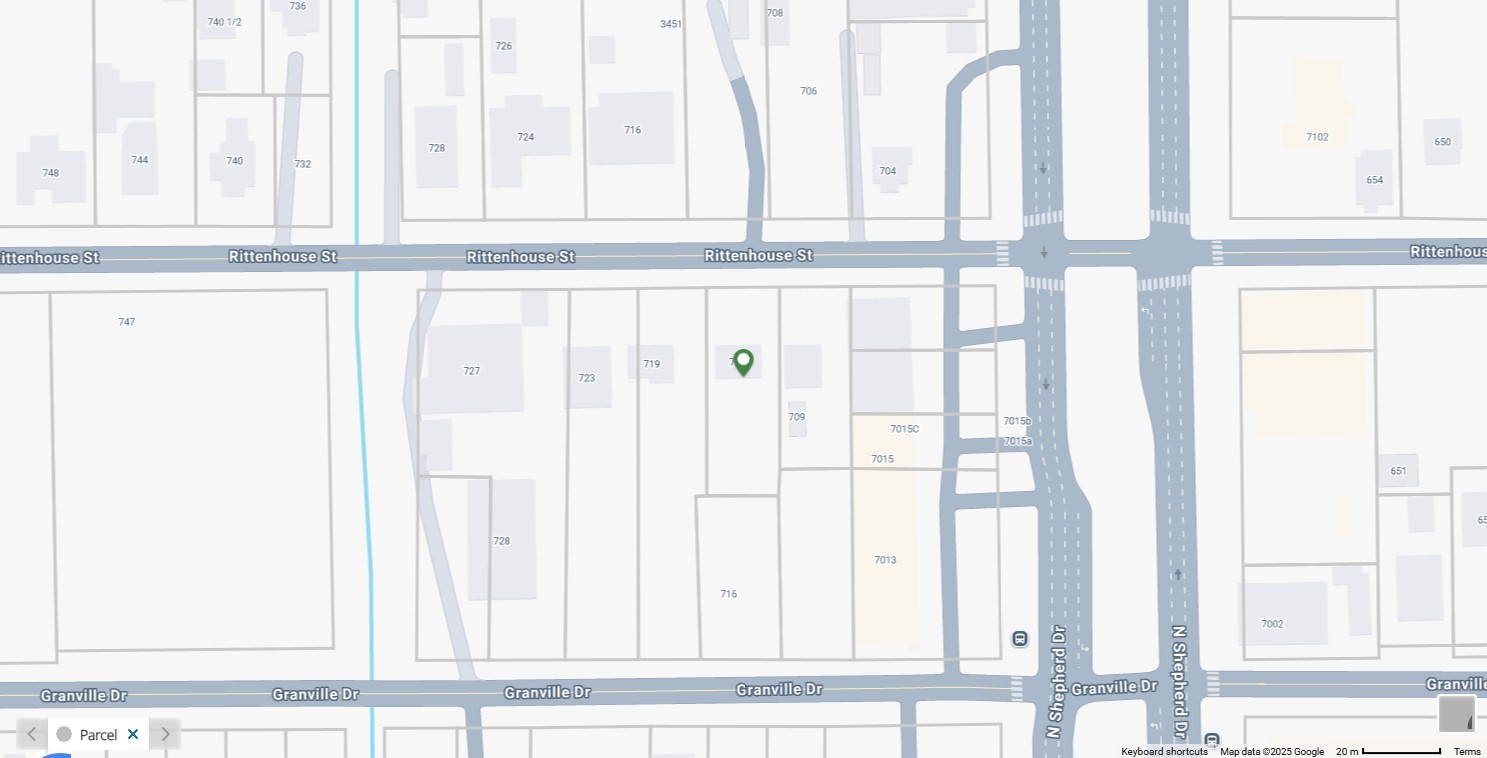 a view of a window and a white cabinet