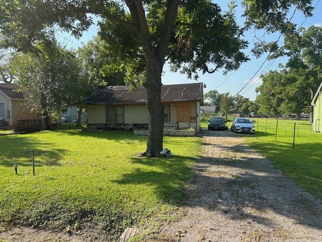 715 West Rittenhouse Street Houston, TX 77091 - Photo 2 of 6 a view of a house with a yard