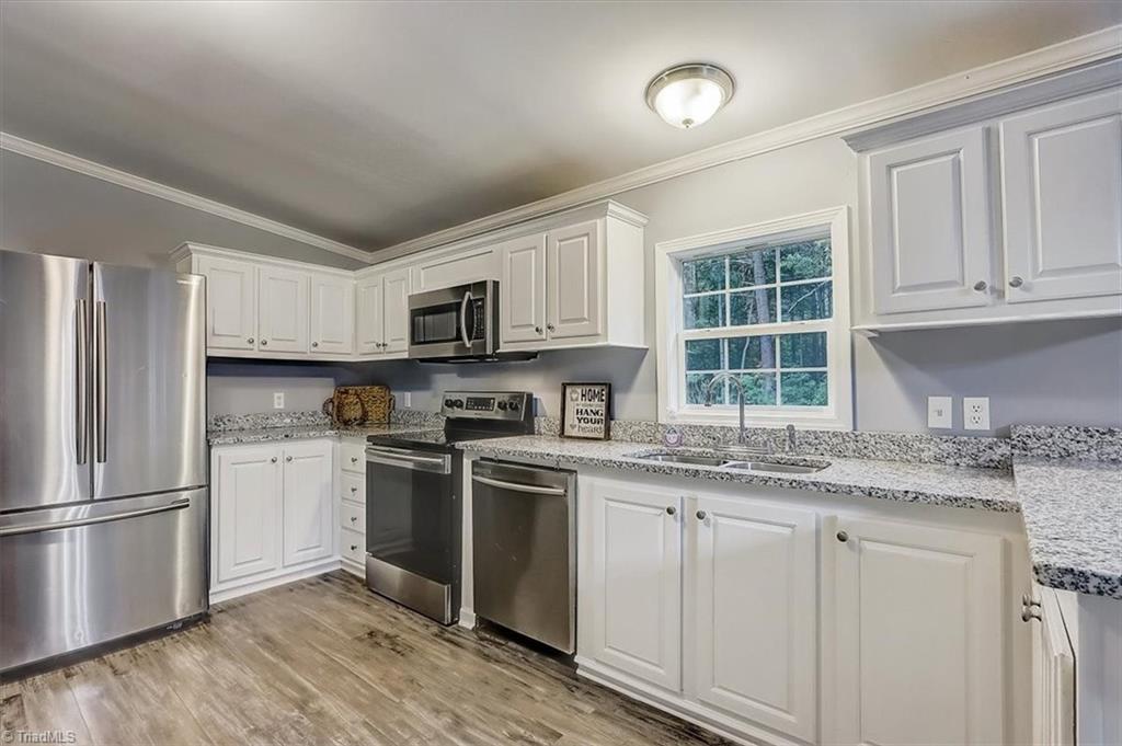 5010 Adder Ridge Lane Burlington, NC 27217 - Photo 11 of 35 Kitchen with ALL stainless steel appliances!