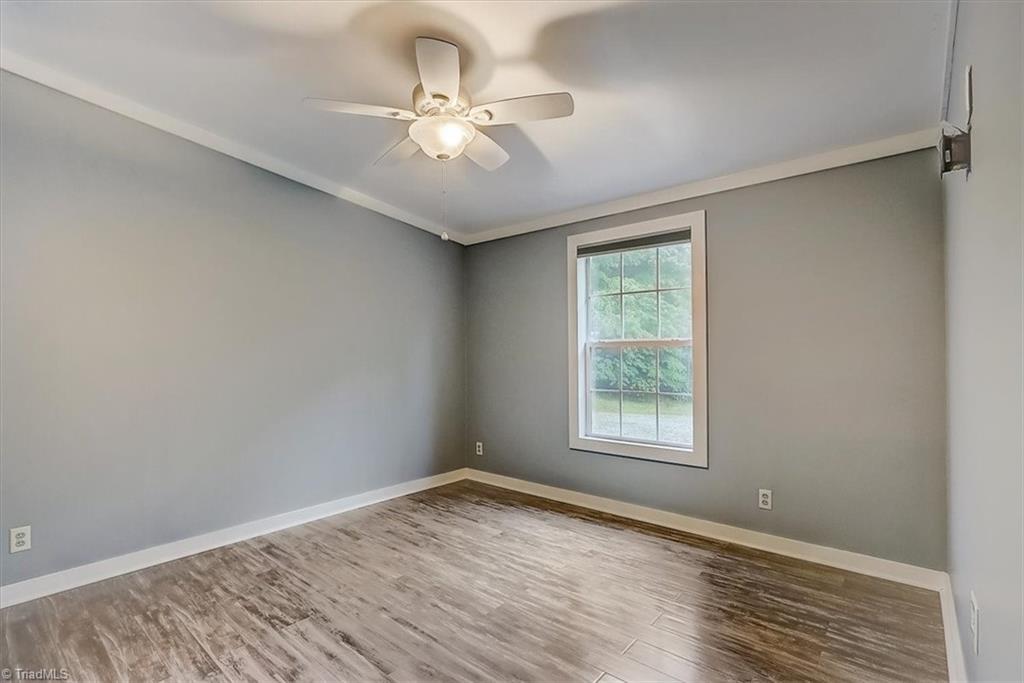 5010 Adder Ridge Lane Burlington, NC 27217 - Photo 22 of 35 Second Bedroom with New Flooring!