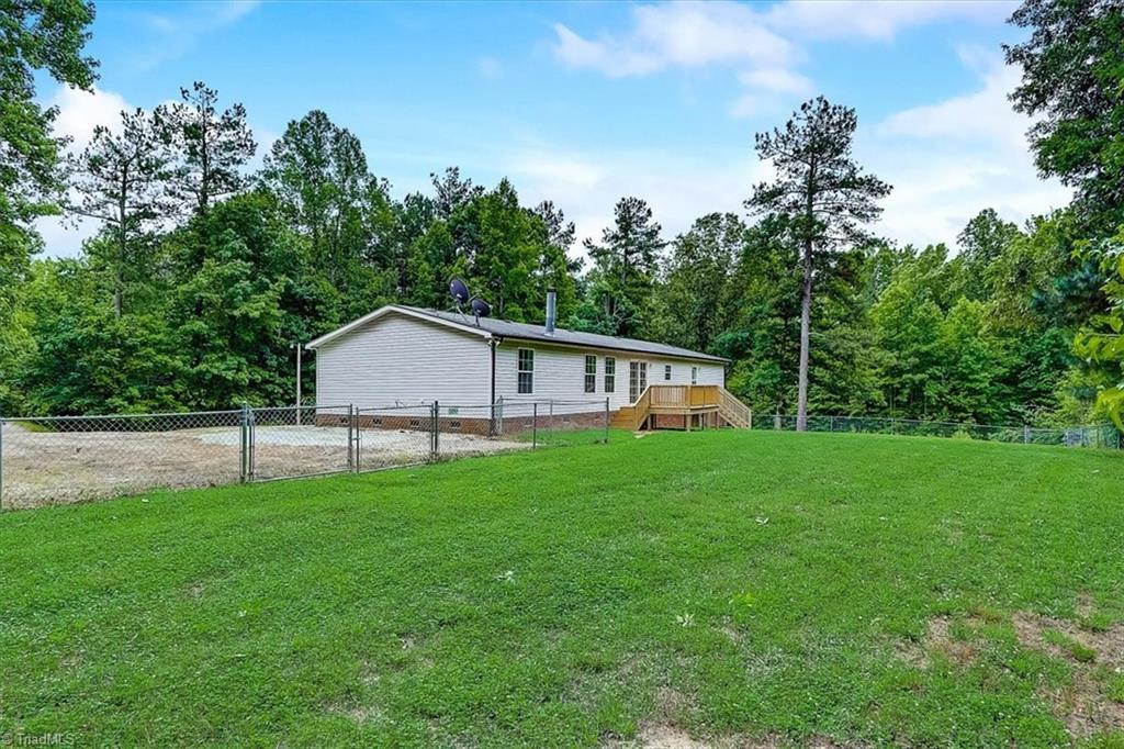5010 Adder Ridge Lane Burlington, NC 27217 - Photo 30 of 35 Side View from Back Yard