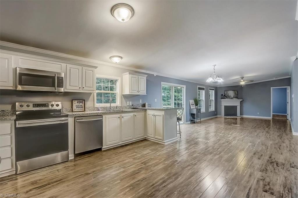 5010 Adder Ridge Lane Burlington, NC 27217 - Photo 9 of 35 New Kitchen with Granite Countertops!