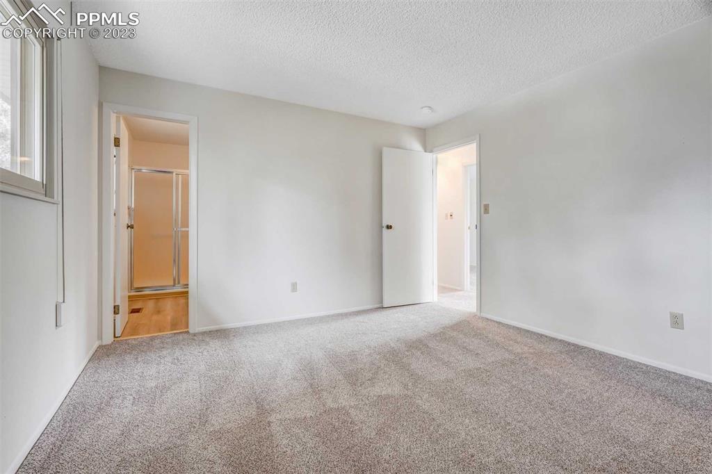 7228 River Bend Road Colorado Springs, CO 80911 - Photo 17 of 48 a view of an empty room and closet area