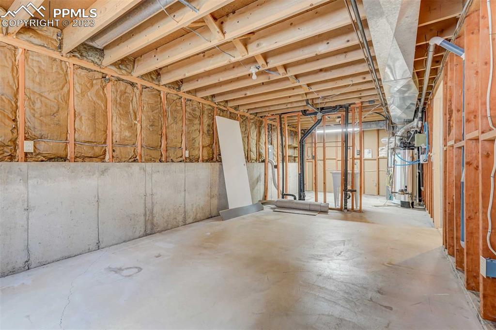 7228 River Bend Road Colorado Springs, CO 80911 - Photo 37 of 48 a view of a room with wooden walls