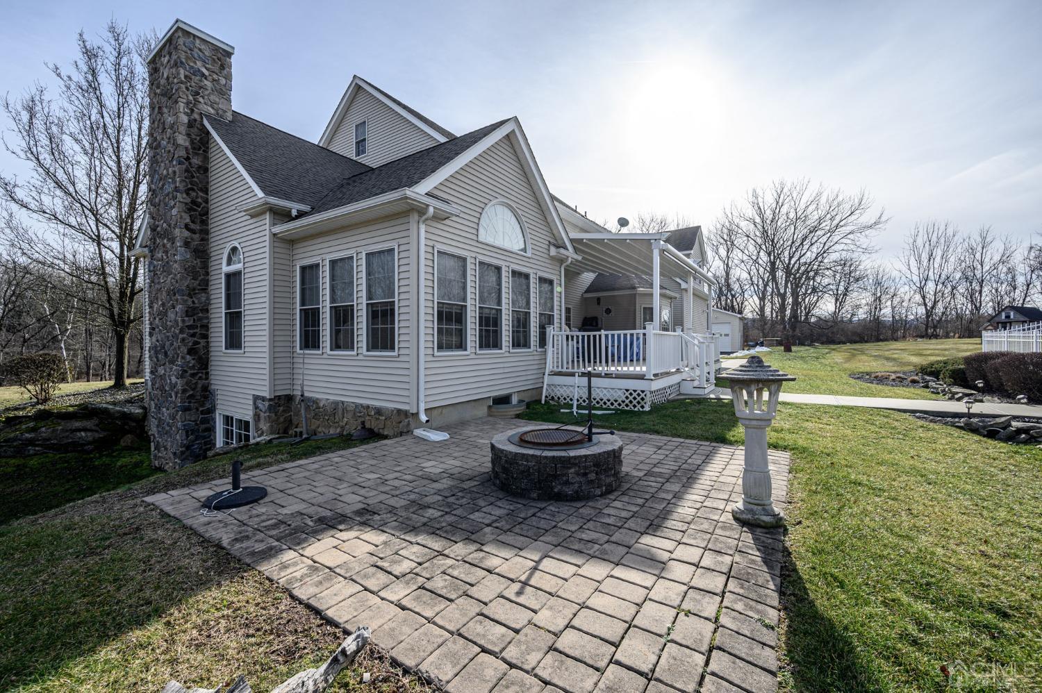 36 Shurts Road Asbury, NJ 08802 - Photo 44 of 56 a view of a house with backyard and sitting area