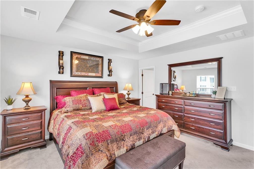 149 Providence Way Pittsburgh, PA 15234 - Photo 14 of 29 a bedroom with a bed and a chandelier