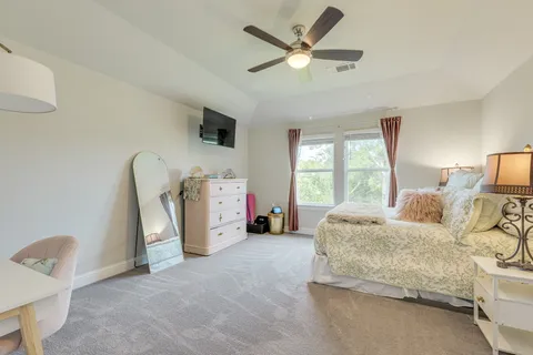 a view of a livingroom with gym equipment