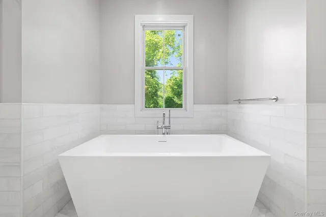 a bathroom with a bathtub