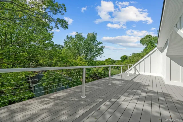 a view of outdoor space with wooden deck