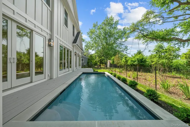 a view of swimming pool from a balcony