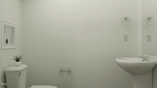 a bathroom with a sink and mirror