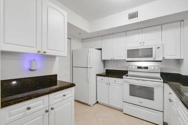 $335,000 | 242 Village Boulevard, Unit 2203, Tequesta, FL 33469