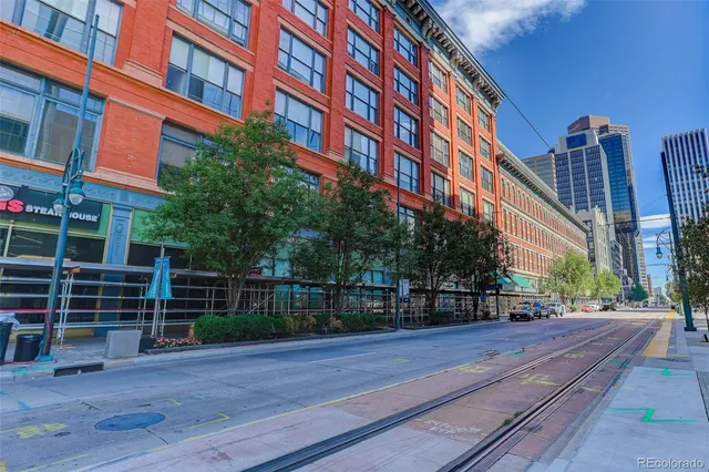 a view of a building with a street