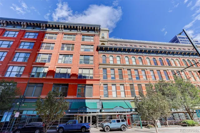 a front view of a building with balcony