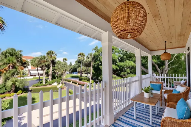 a view of a porch with furniture