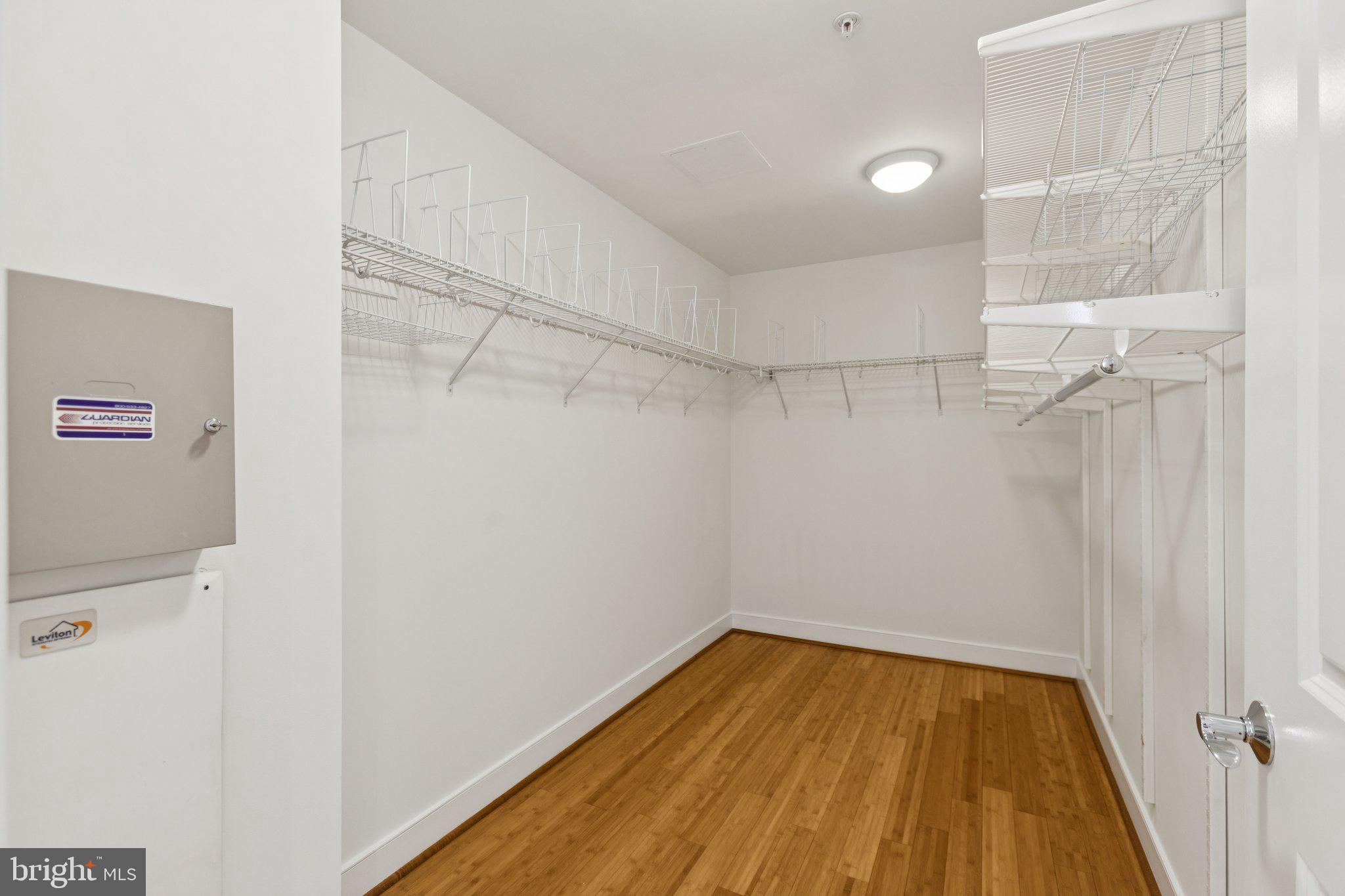2425 L Street Northwest, Unit 210 Washington, DC 20037 - Photo 18 of 39 a view of a room with wooden floor