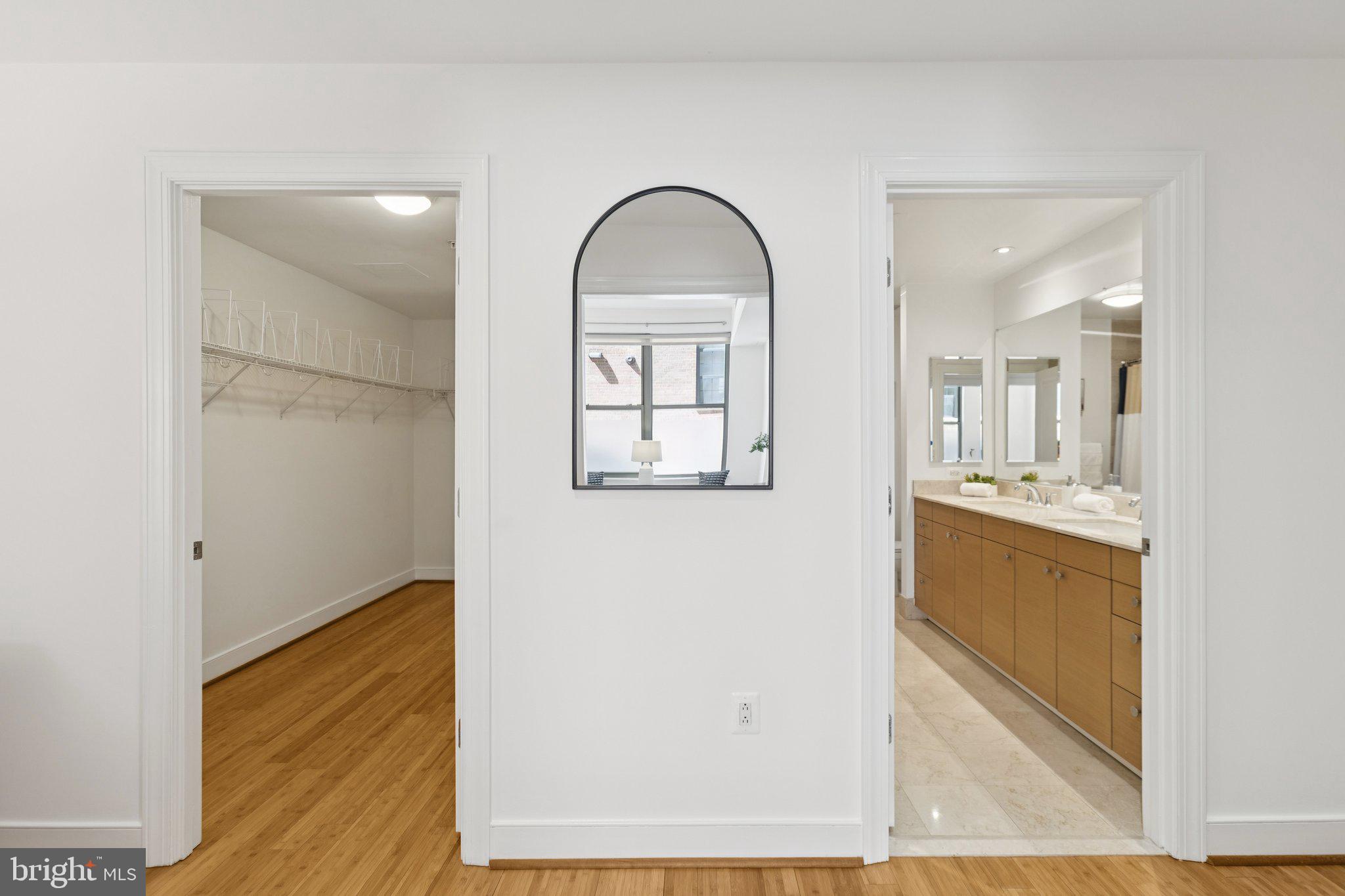 2425 L Street Northwest, Unit 210 Washington, DC 20037 - Photo 20 of 39 a view of an entryway with wooden floor
