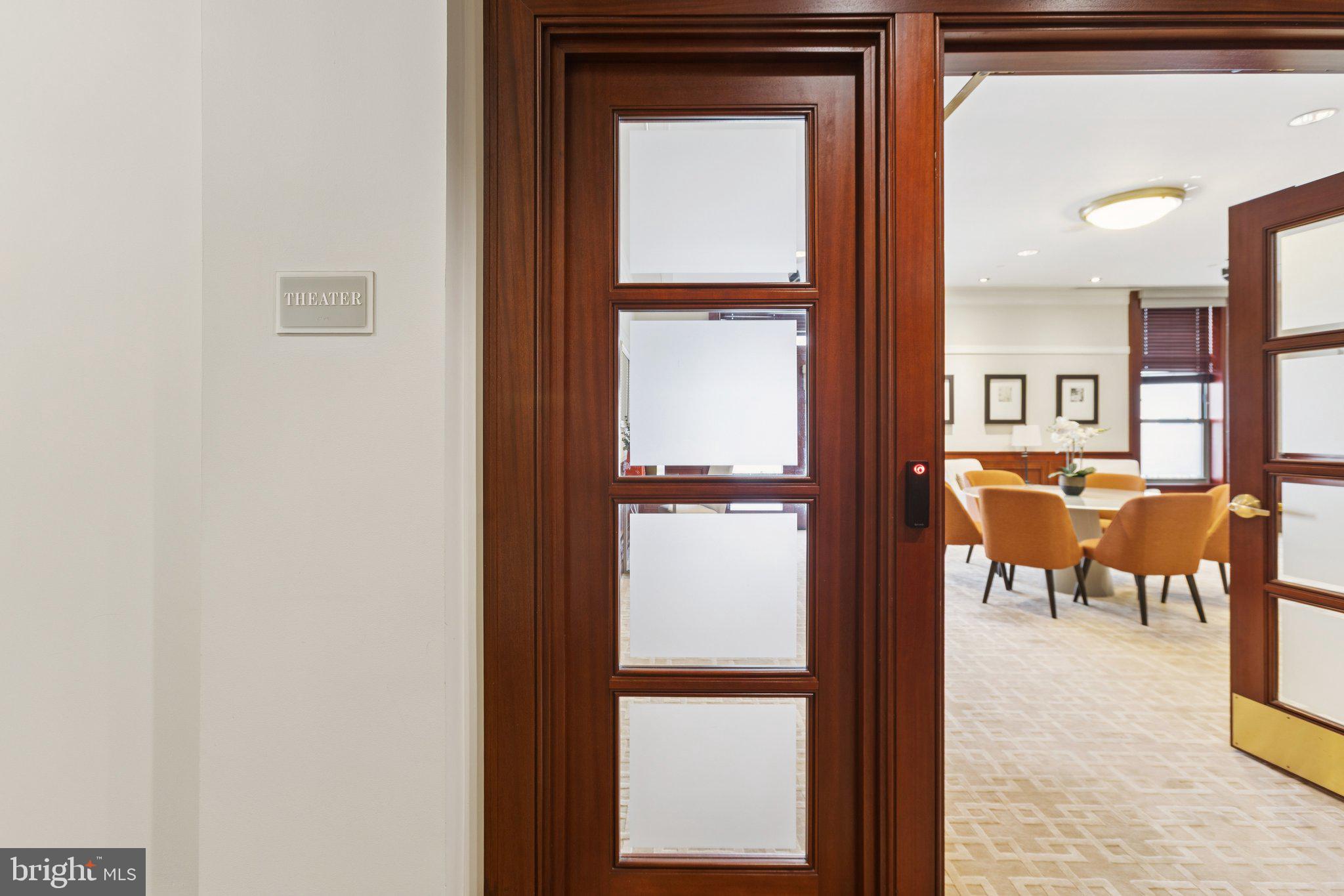 2425 L Street Northwest, Unit 210 Washington, DC 20037 - Photo 36 of 39 view of living room with a table and chairs