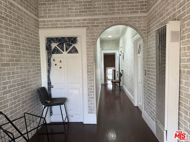 a view of a backyard with sitting area