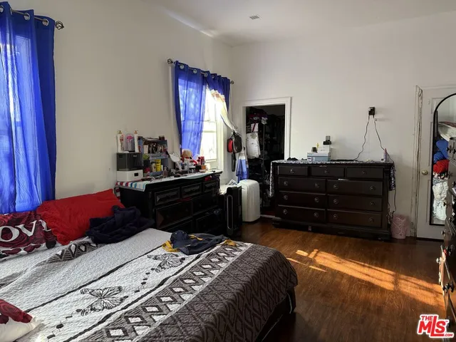 a view of a patio with table and chairs