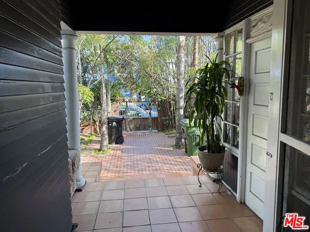 a brick building with a yard