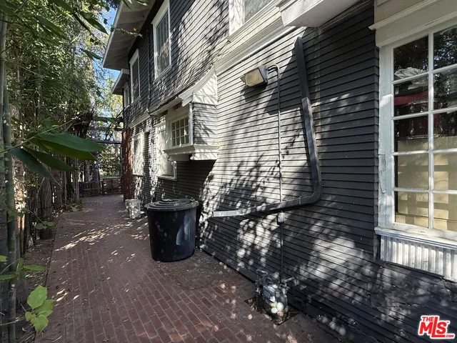 an outdoor space with lots of different kinds of flowers