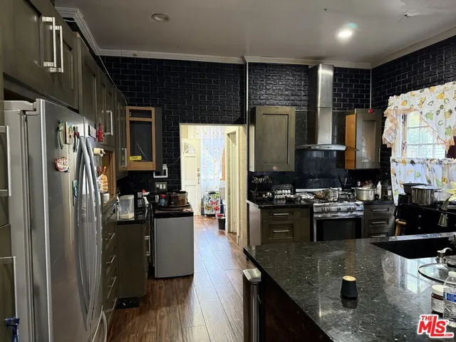 a bedroom with bed and a window